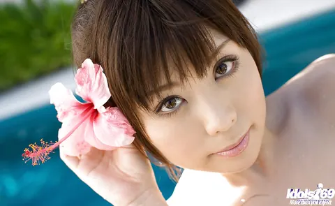 Aya Hirai: Japanese Babe with Big Natural Tits Strips by the Pool – photo 13 of 15