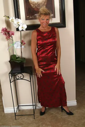 Tanned Latina MILF Undresses to Reveal Her Tattoo