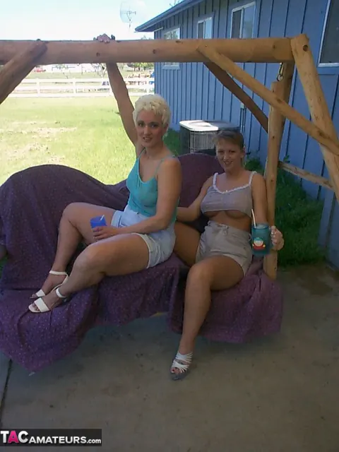 Thick MILFs Have Lesbian Sex with a Dildo on a Bench Swing – photo 2 of 20