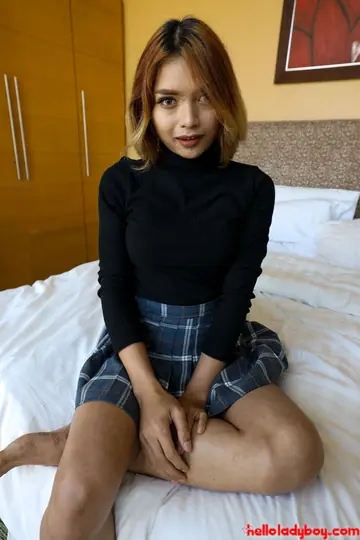 Tattooed Trans Woman Strips Off Her Skirt and Sucks Cock in the Bedroom