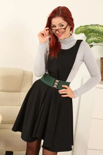 Redhead Strips Out of Her Secretary Lingerie and Stockings in the Office