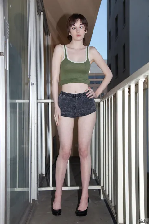 Lilly Gardner: Cute Short-Haired Brunette Strips and Spreads on the Balcony and Sofa – photo 4 of 11