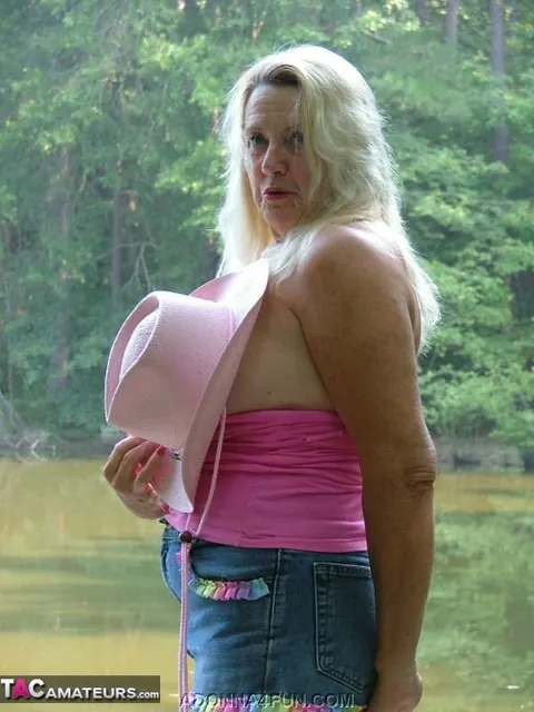 Busty Mature Blonde Strips Out of Her Shorts on a Balcony – photo 3 of 20
