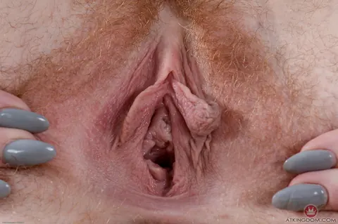Kierra Wilde: Busty Redhead with Hairy Pussy and Natural Tits Strips Nude – photo 18 of 21
