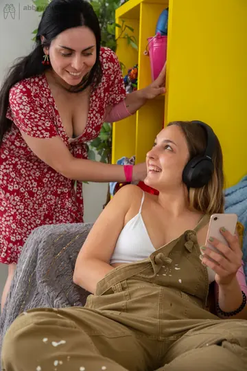 Two Curvy Latinas Undress and Finger Hairy Pussies