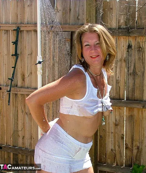 Mature PAWG with Pierced Pussy Spreads by the Pool – photo 2 of 16