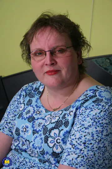 Curvy Mature European Woman in Glasses Plays with a Dildo