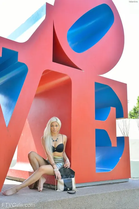 Valentina Paradis: Blonde Latina Flashes Her Small Natural Tits Outdoors in a Skirt and Heels – photo 11 of 16