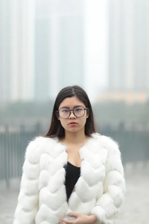Asian Brunette in Glasses Poses Outdoors in Her Clothes – photo 10 of 21