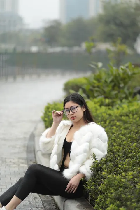 Asian Brunette in Glasses Poses Outdoors in Her Clothes – photo 14 of 21