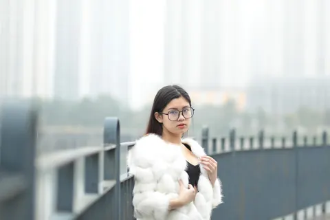 Asian Brunette in Glasses Poses Outdoors in Her Clothes – photo 6 of 21