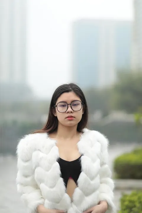 Asian Brunette in Glasses Poses Outdoors in Her Clothes – photo 12 of 21