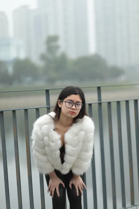 Asian Brunette in Glasses Poses Outdoors in Her Clothes – photo 3 of 21