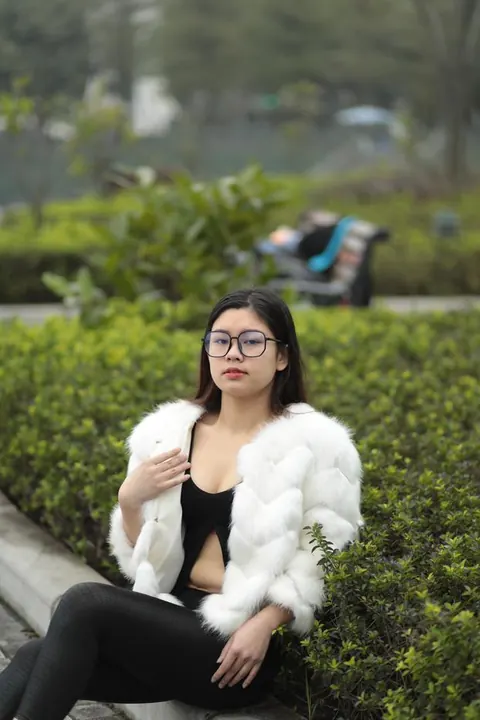Asian Brunette in Glasses Poses Outdoors in Her Clothes – photo 13 of 21