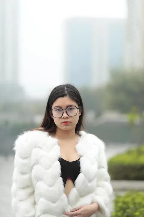 Asian Brunette in Glasses Poses Outdoors in Her Clothes – photo 11 of 21