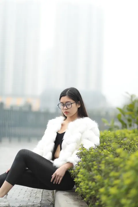 Asian Brunette in Glasses Poses Outdoors in Her Clothes – photo 20 of 21