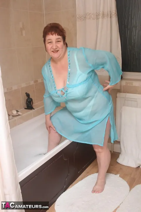 Kinky Carol: Busty Redhead in Panties and Heels Spreads in the Bathroom – photo 8 of 20