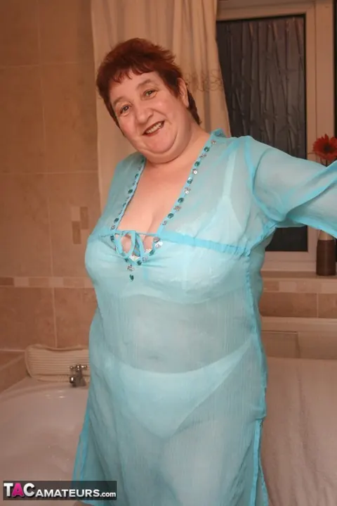 Kinky Carol: Busty Redhead in Panties and Heels Spreads in the Bathroom – photo 1 of 20