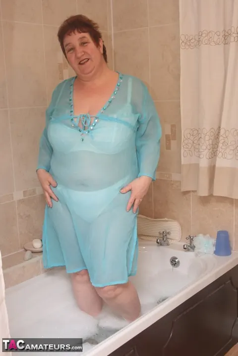 Kinky Carol: Busty Redhead in Panties and Heels Spreads in the Bathroom – photo 10 of 20
