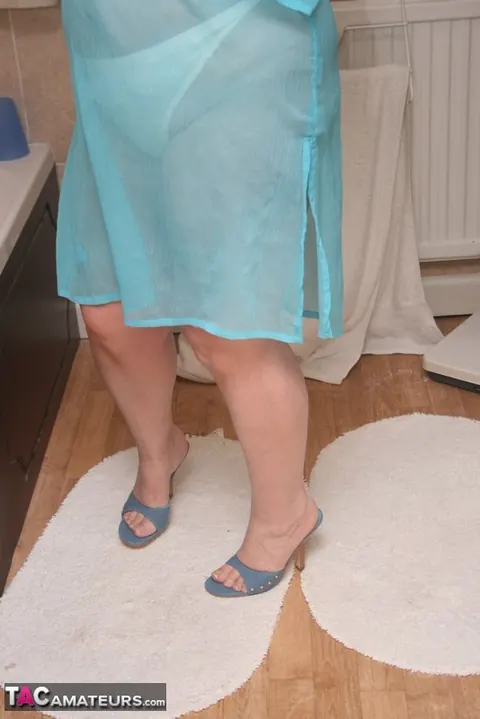 Kinky Carol: Busty Redhead in Panties and Heels Spreads in the Bathroom – photo 5 of 20
