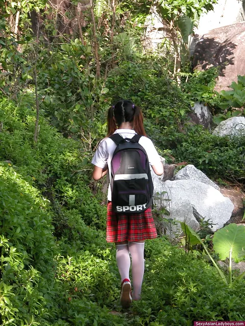 Asian Trans Woman Spreads Her Legs While Reading Outdoors – photo 1 of 12