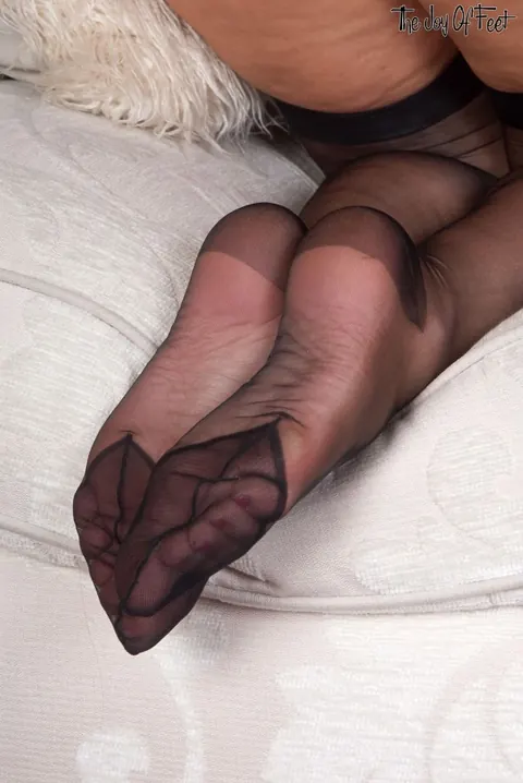 Thick Brunette MILF Spreads and Shows Her Feet in Stockings – photo 10 of 16