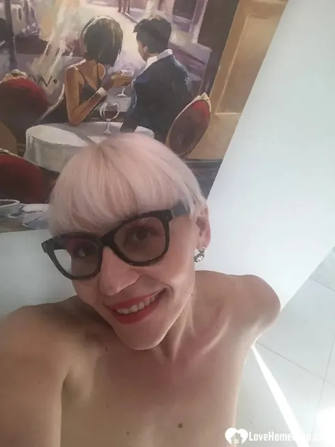 Blonde MILF Strips and Flashes Her Big Tits in the Mirror – photo 6 of 18