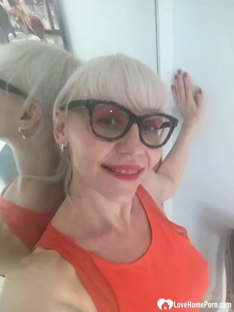 Blonde MILF Strips and Flashes Her Big Tits in the Mirror – photo 14 of 18