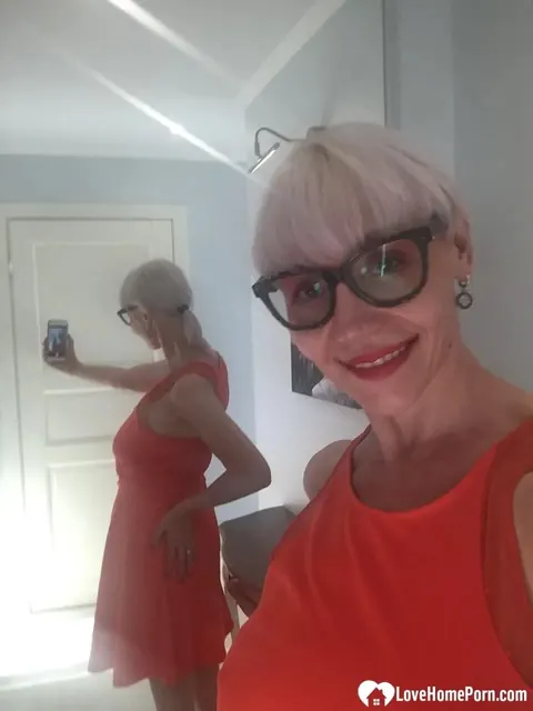 Blonde MILF Strips and Flashes Her Big Tits in the Mirror – photo 9 of 18