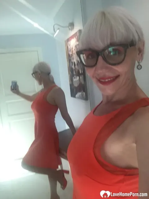 Blonde MILF Strips and Flashes Her Big Tits in the Mirror – photo 10 of 18