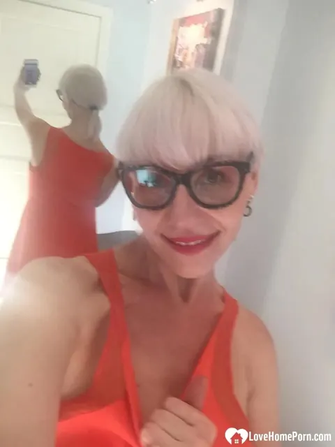 Blonde MILF Strips and Flashes Her Big Tits in the Mirror – photo 12 of 18