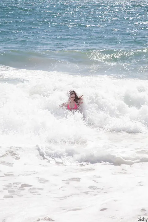 Natalie Moore: Busty Brunette in a Bikini Spreads Her Legs on the Beach – photo 4 of 11