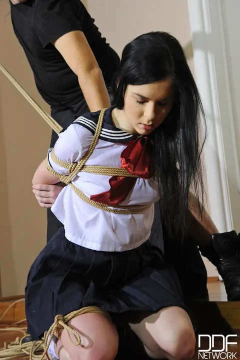 Amber Nevada: Tattooed Brunette in Uniform Bound in Rope Bondage – photo 19 of 21
