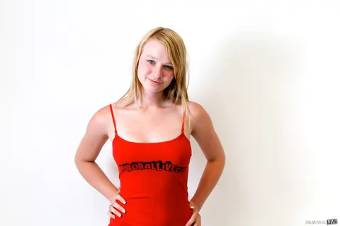 Maci More: Slim Blonde Poses in a Skirt and Sports Socks – photo 3 of 15