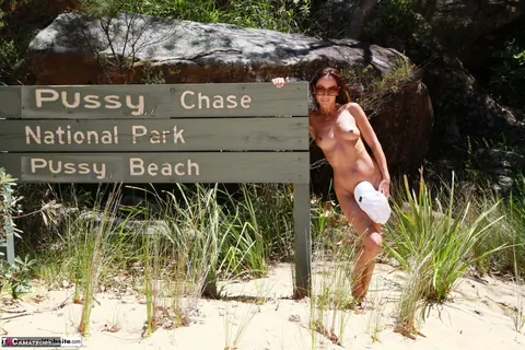 Redhead MILF with Big Tits Poses Nude at the Beach – photo 13 of 16
