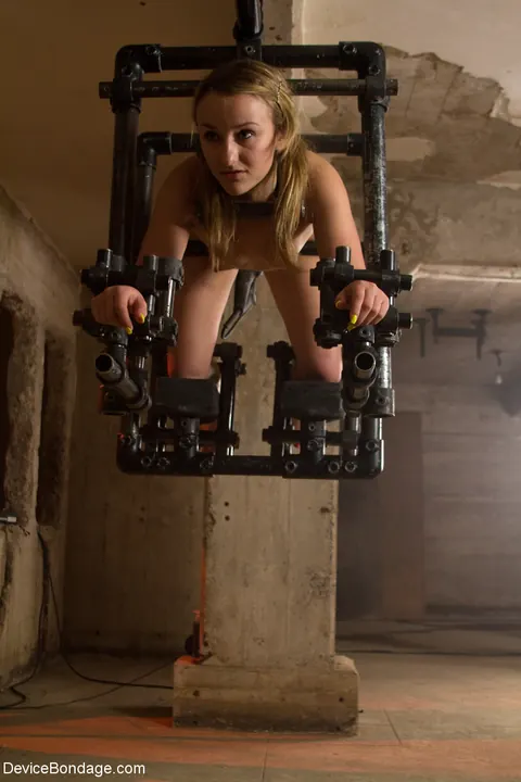 Jessie Cox: Blonde in Metal Bondage Masturbates with a Dildo – photo 7 of 17