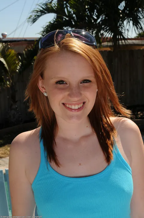 Katey Grind: Slim Redhead Strips Nude and Shows Her Tattooed Body – photo 1 of 21