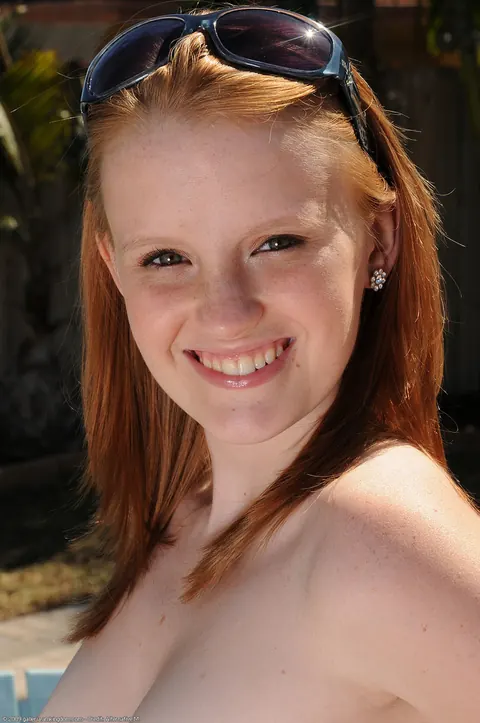 Katey Grind: Slim Redhead Strips Nude and Shows Her Tattooed Body – photo 17 of 21