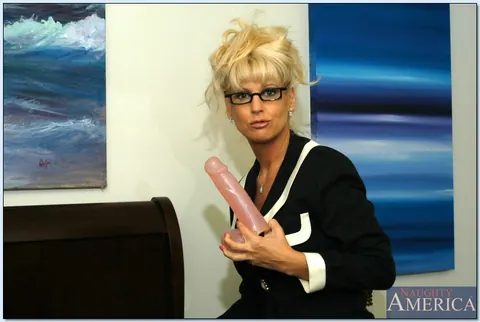 Vicki Vogue: Mature Blonde MILF in Stockings and Glasses Plays with a Dildo – photo 13 of 16