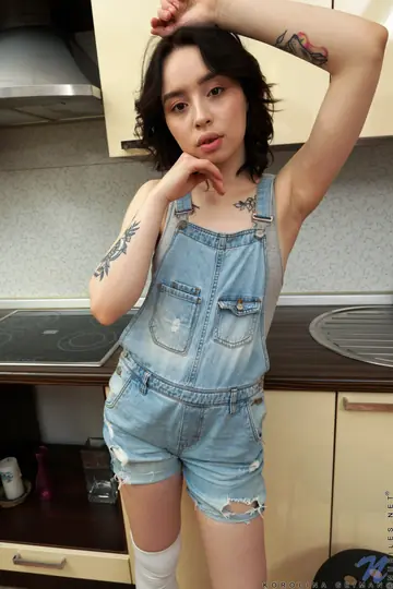 Korolina Beiman – Petite Brunette in Jeans Pulls Denim Aside