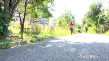 Busty Czech Redhead in Leather Pulls Down Pants and Pisses