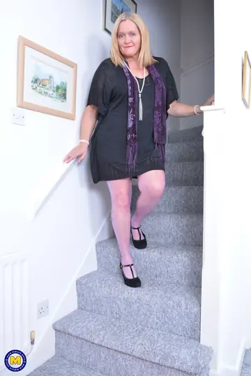 British Blonde MILF Strips Out of Her Dress and Lingerie with Stockings