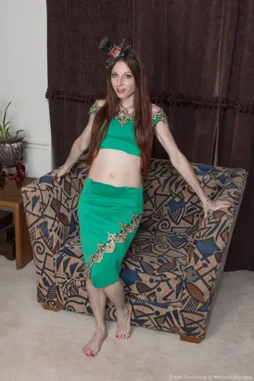 Evane Nordstern – Petite Redhead Lifts Her Green Skirt and Spreads Her Hairy Pussy
