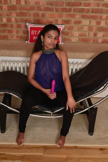 Ebony Brunette Undresses and Masturbates with a Dildo