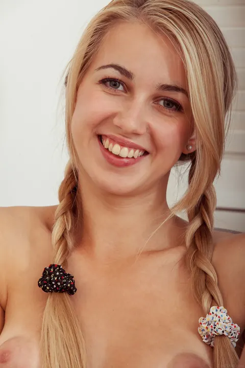 Woman with Pigtails Spreads Her Legs Wide – photo 12 of 21