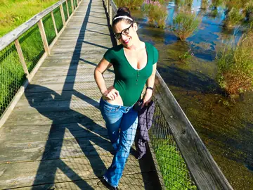 Brunette MILF Poses in Jeans Showing Her Big Natural Tits