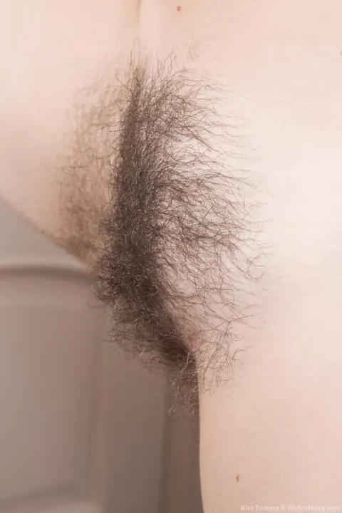 Kira Tomson: Russian Brunette Undresses to Show Her Hairy Pussy – photo 5 of 16