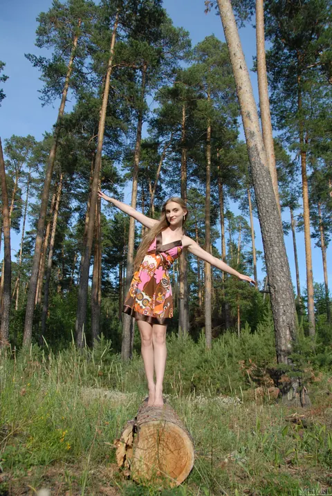 Slim Woman Strips Out of Her Skirt Outdoors – photo 3 of 21