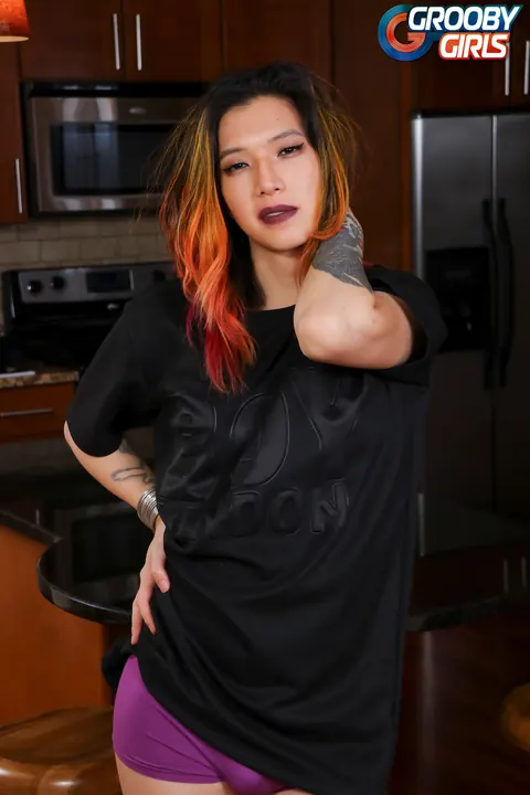 Curvy Black-Haired Trans Woman Strips and Poses Nude – photo 1 of 16