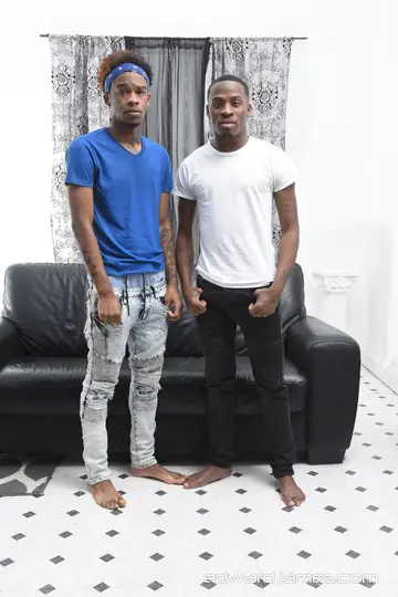 Two Ebony Men Fuck Doggy Style on the Sofa